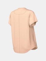 Light peach FC Barcelona Nike women's t-shirt with short sleeves and club crest on the chest.