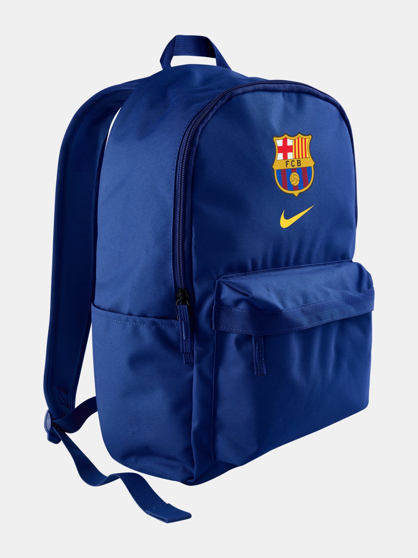 FC Barcelona 2025/26 backpack in deep royal blue, featuring the iconic club crest and a yellow Nike swoosh on the front. Includes a large main compartment, a front zip pocket for essentials, and padded shoulder straps for comfort.
