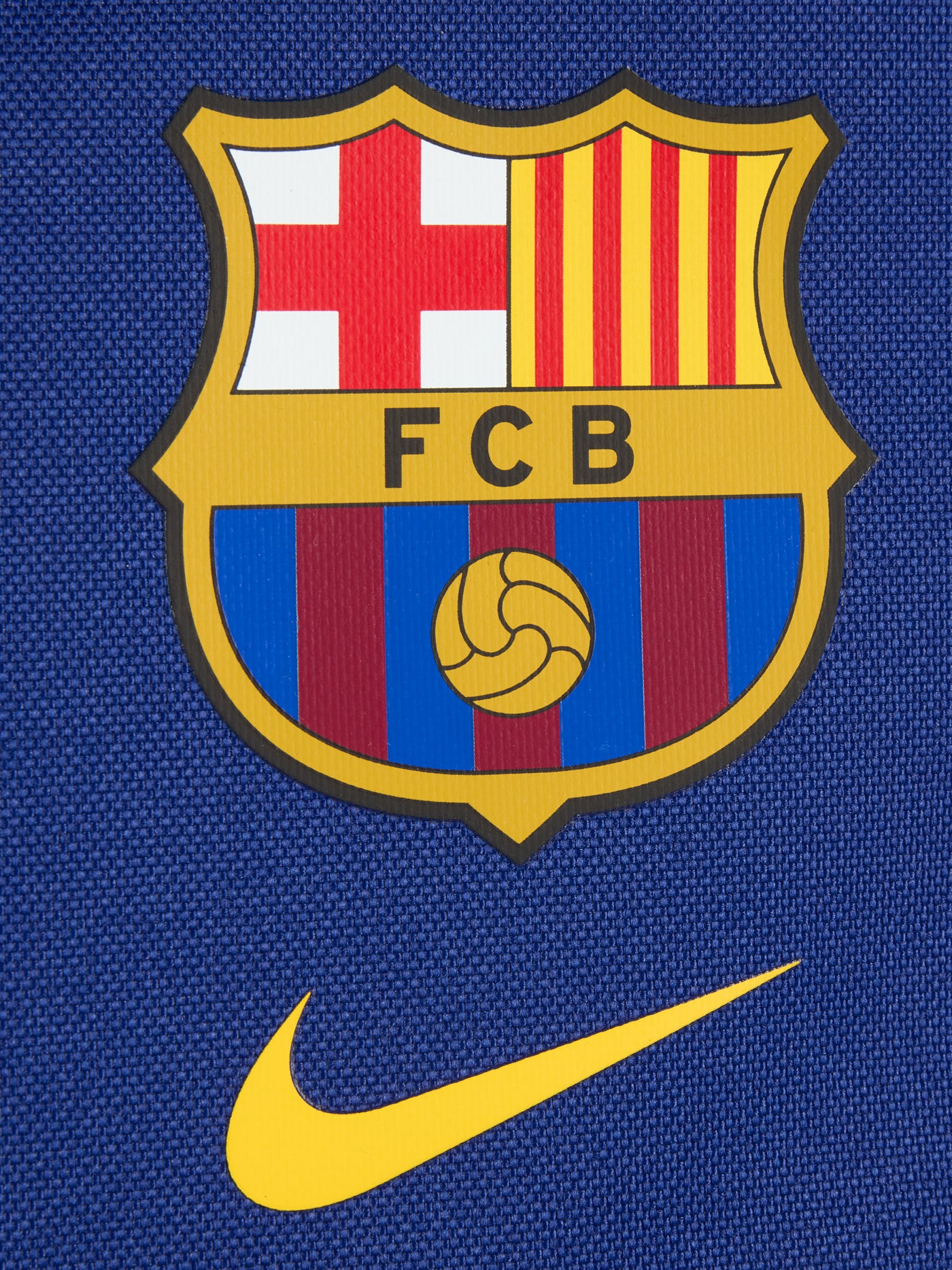 FC Barcelona 2025/26 backpack in deep royal blue, featuring the iconic club crest and a yellow Nike swoosh on the front. Includes a large main compartment, a front zip pocket for essentials, and padded shoulder straps for comfort.
