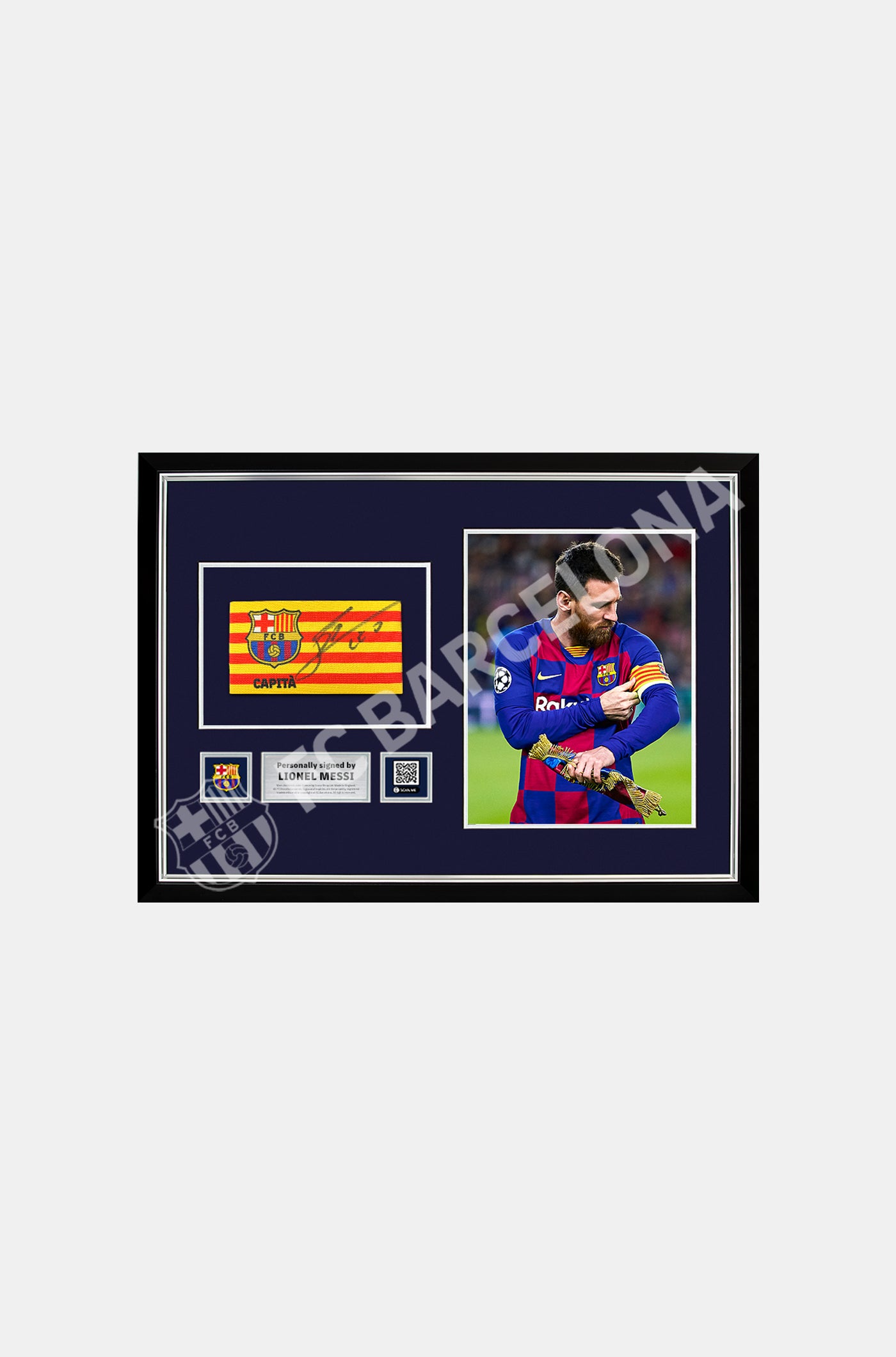 Brazalete de capitán del FC Barcelona firmado por Lionel Messi y enmarcado