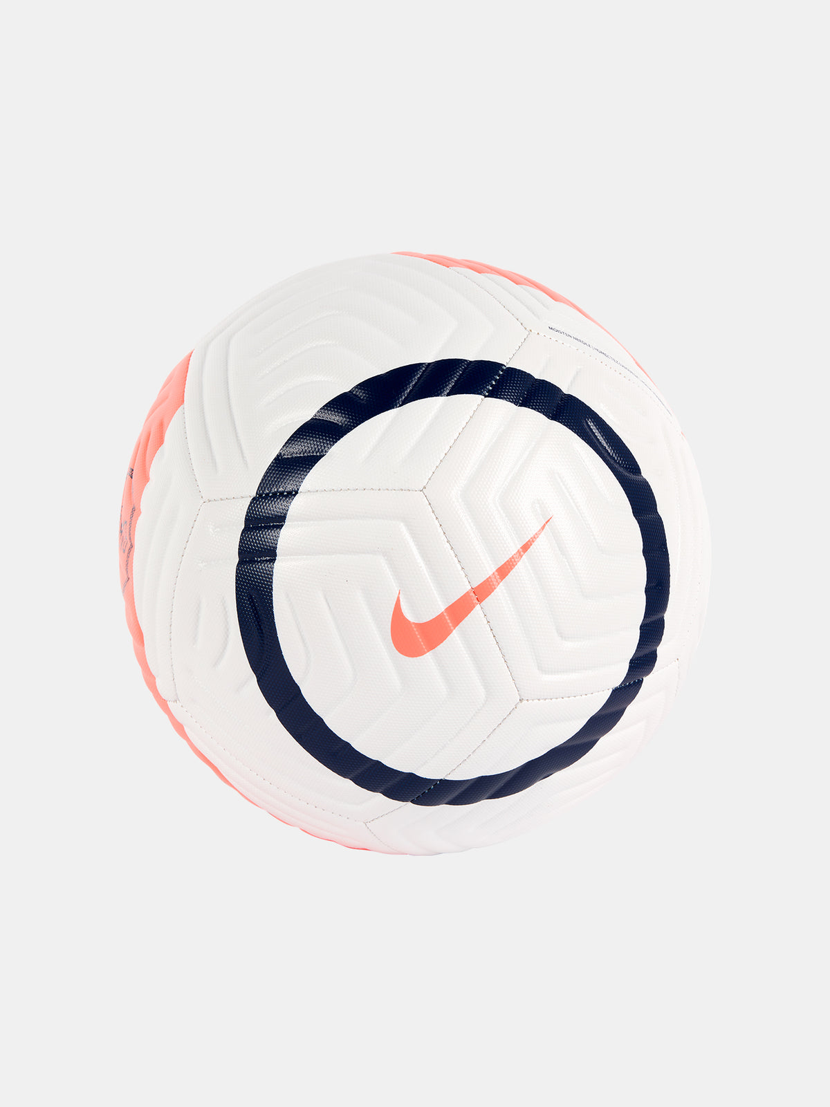 White Nike football with textured panels, navy blue circular design, and coral swoosh logo