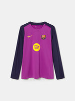Front view of FC Barcelona 25/26 long-sleeve training top in purple with dark sleeves, featuring Spotify logo, Nike swoosh, and club crest