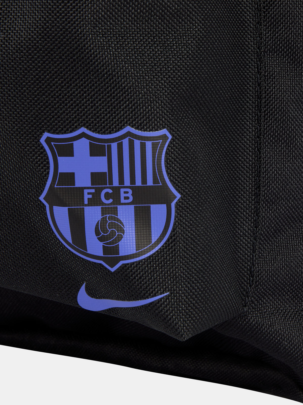 Black FC Barcelona Nike backpack featuring the Kobe Bryant logo in blue on the upper front and the Barça crest with Nike swoosh in blue on the lower pocket.