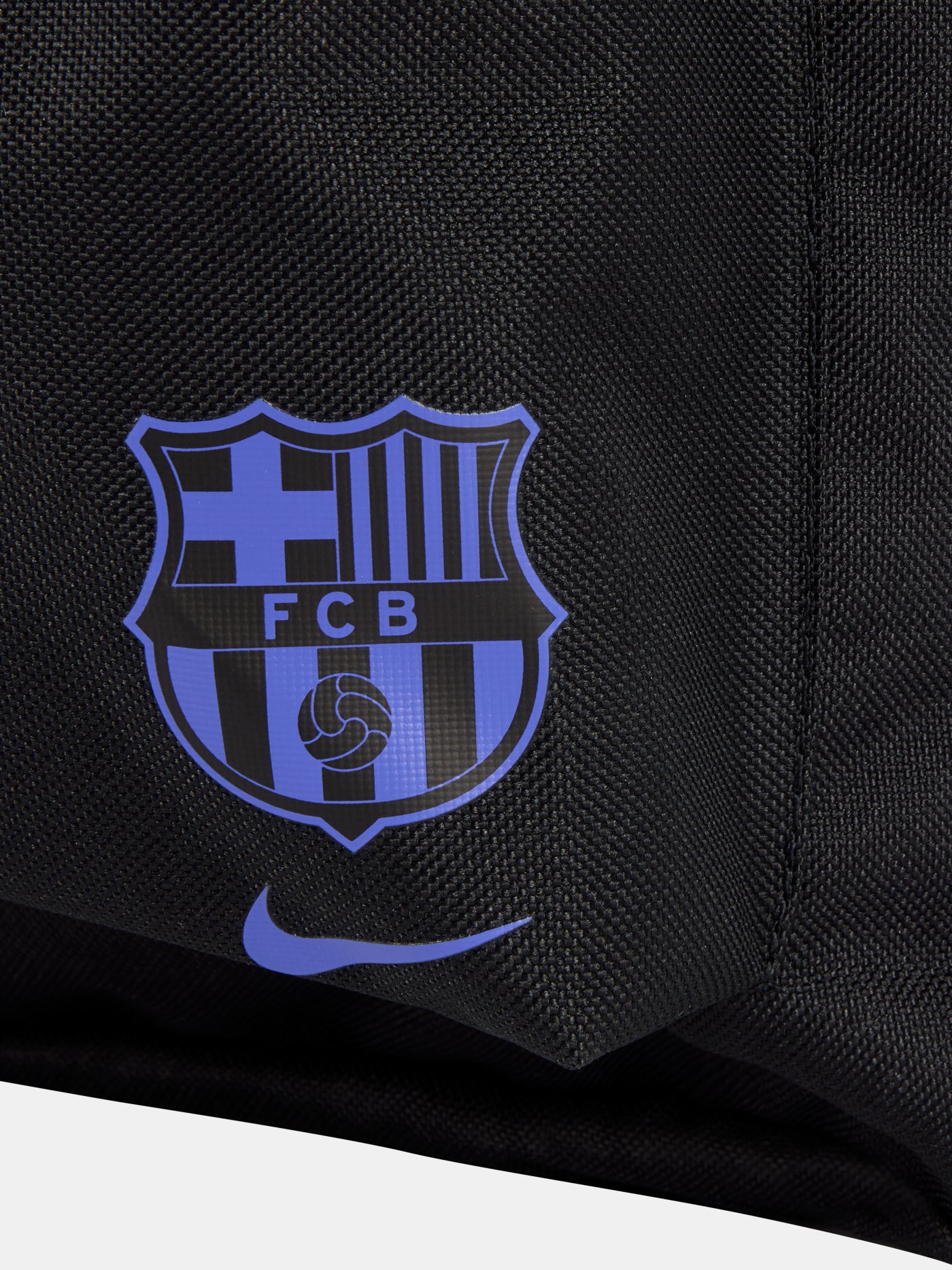 Black FC Barcelona Nike backpack featuring the Kobe Bryant logo in blue on the upper front and the Barça crest with Nike swoosh in blue on the lower pocket.