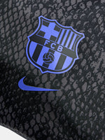 Black FC Barcelona drawstring bag featuring Kobe Bryant’s logo in purple and the Barça crest with Nike swoosh in the bottom corner