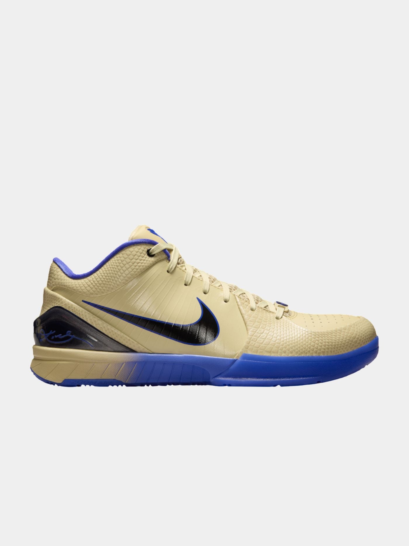 Beige and blue sneaker with Nike logo on a white background