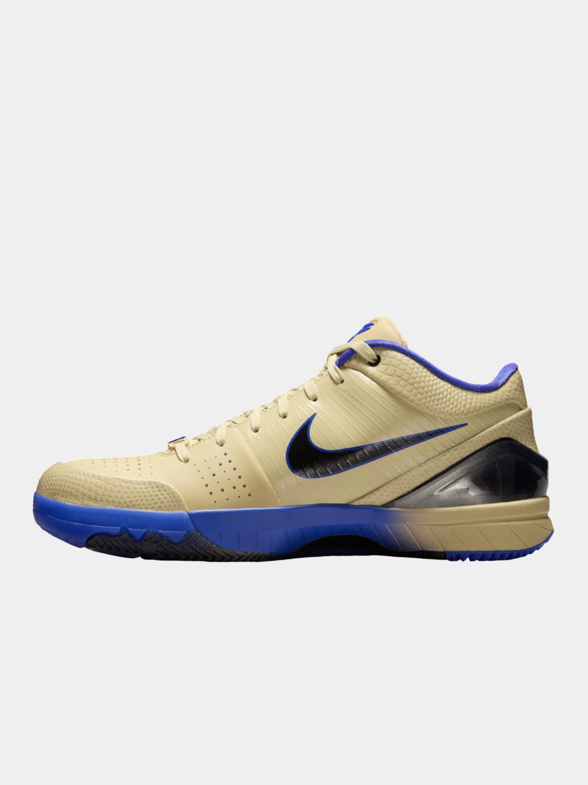 Beige and blue sneaker with Nike logo on a white background