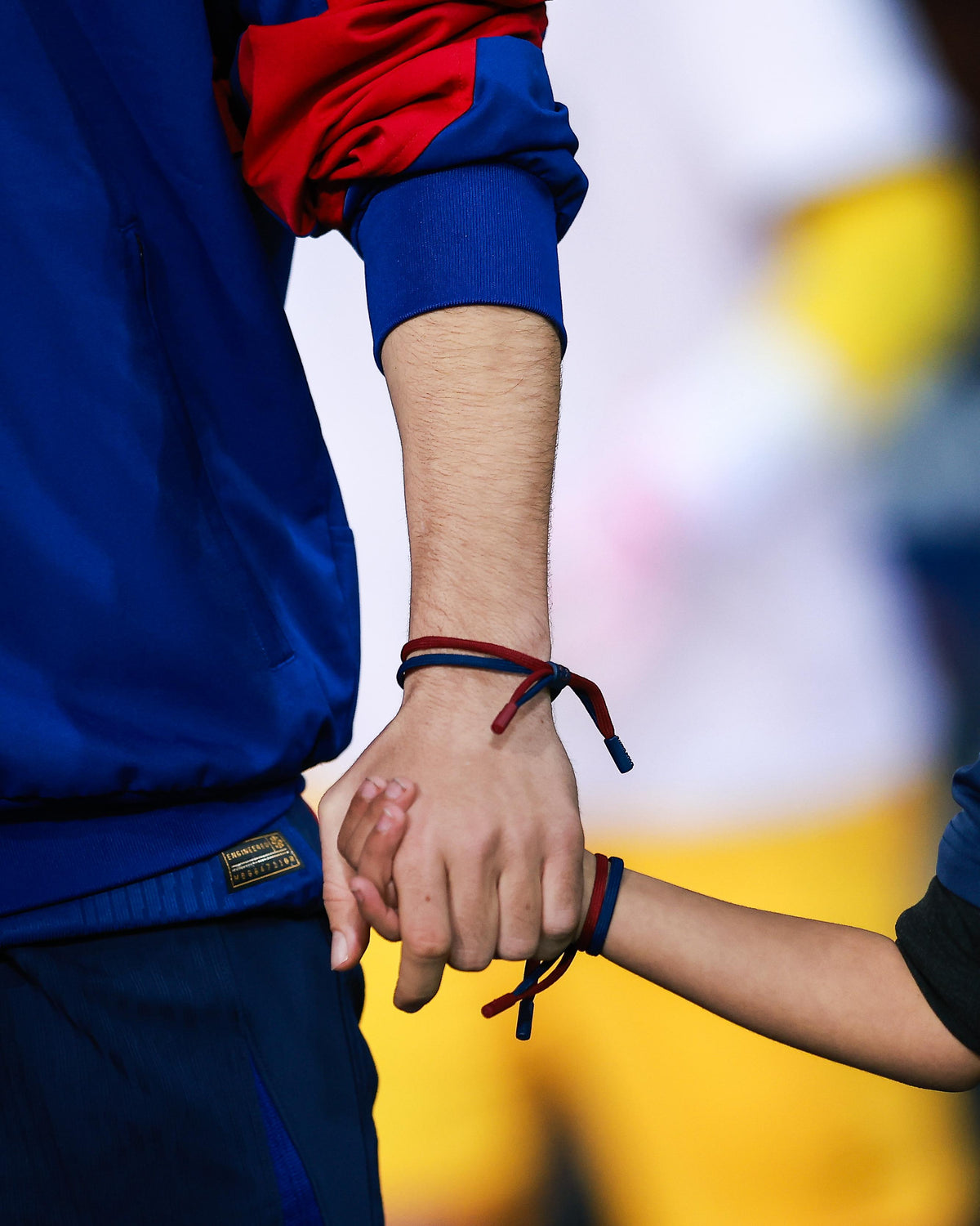 Braided bracelet in classic FC Barcelona colors—deep blue and vibrant red—featuring a subtle yet bold contrast that reflects the club’s identity. The design includes a small clasp or knot detail in the center, reinforcing the sporty and casual aesthetic. It's a minimal but expressive accessory, perfect for fans who want to wear their passion in a subtle, stylish way.
