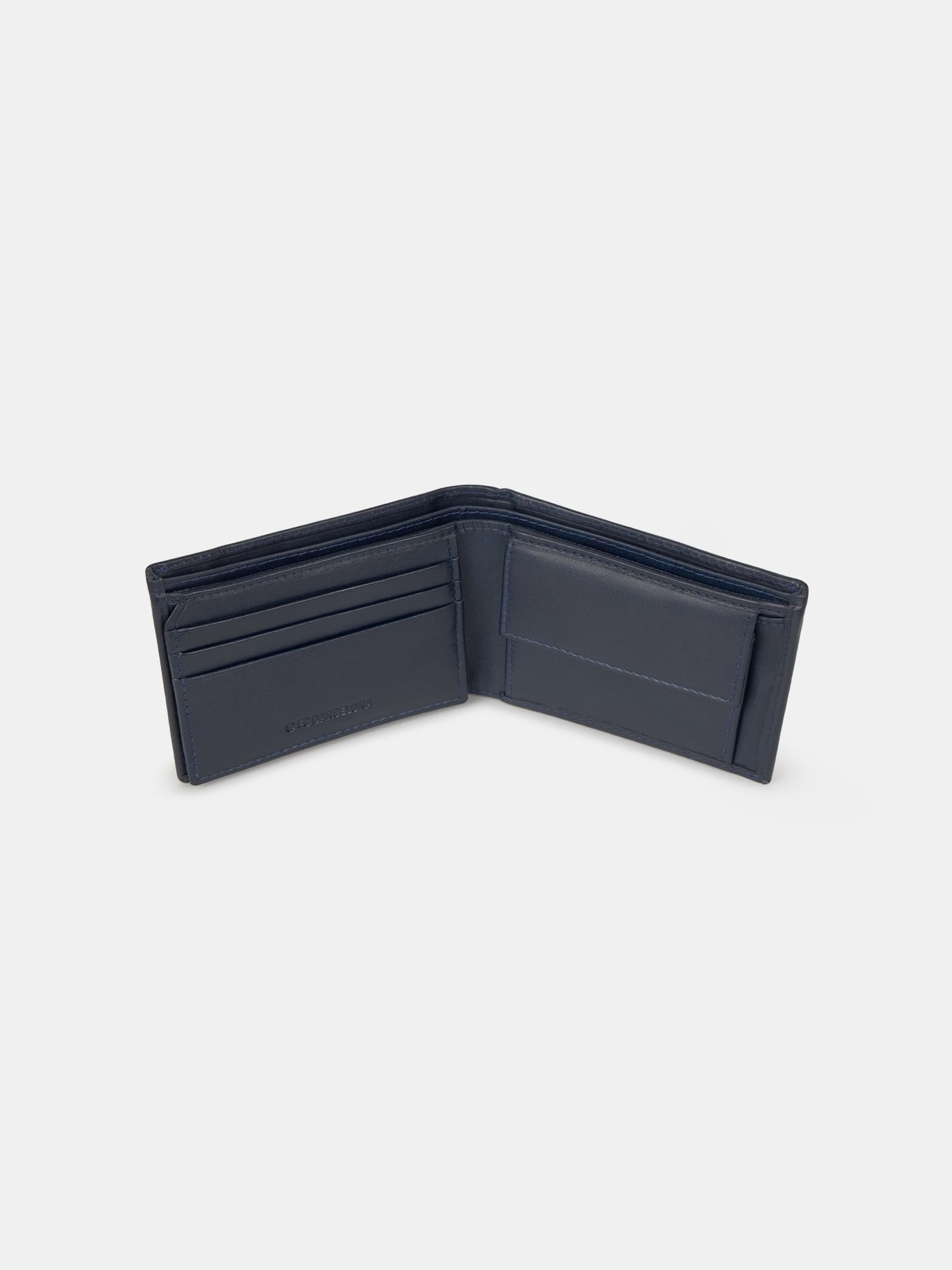 Navy blue FC Barcelona leather wallet with metallic club crest on the front.