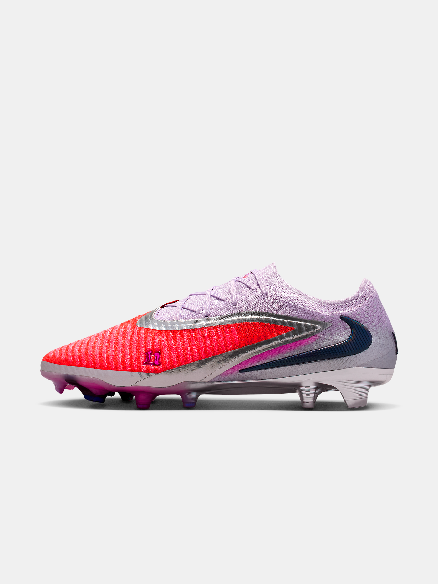 Soccer cleat with red and purple design on a white background