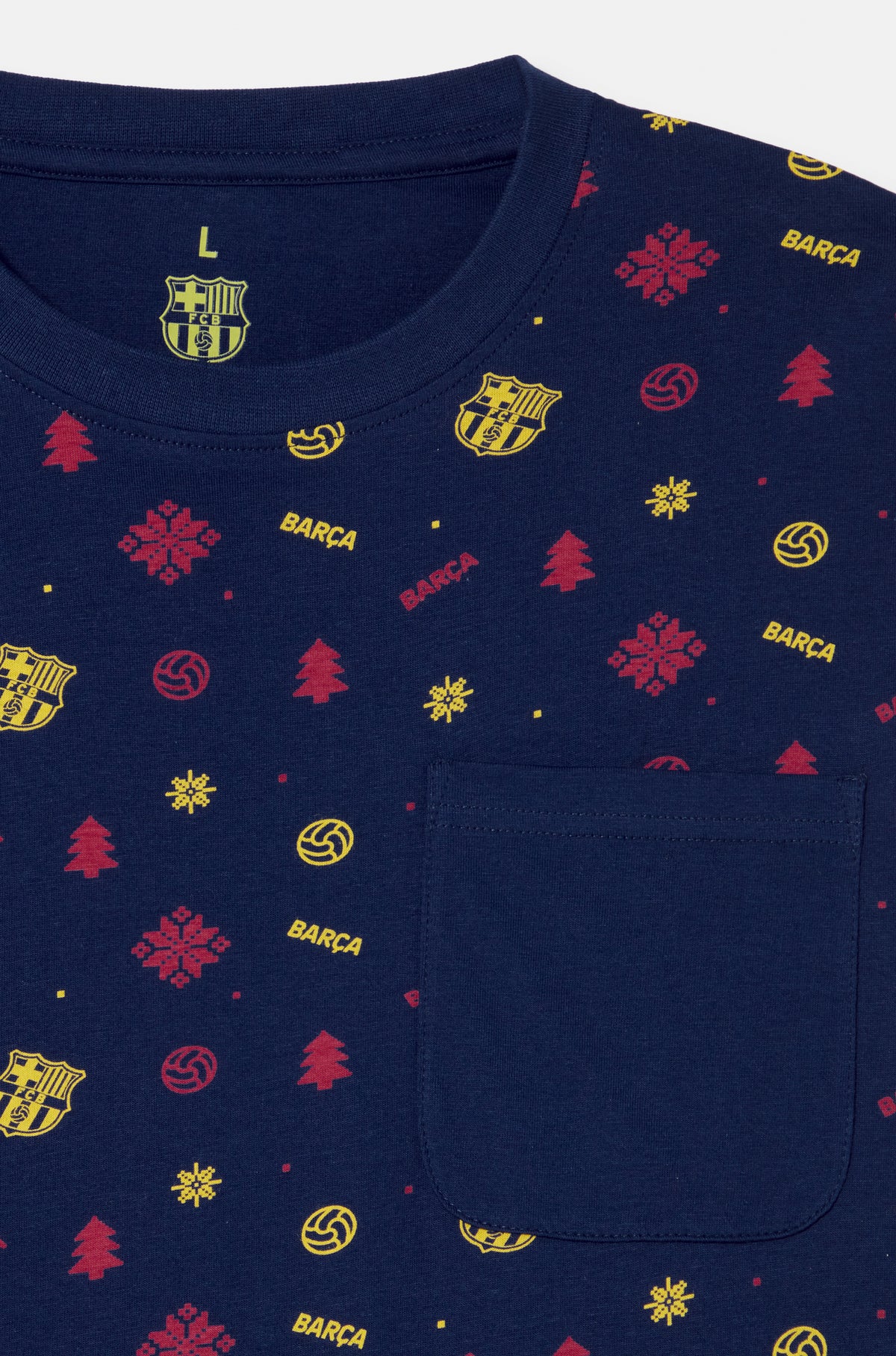 Close-up of a navy FC Barcelona T-shirt with a chest pocket and all-over red and yellow Barça holiday icons.