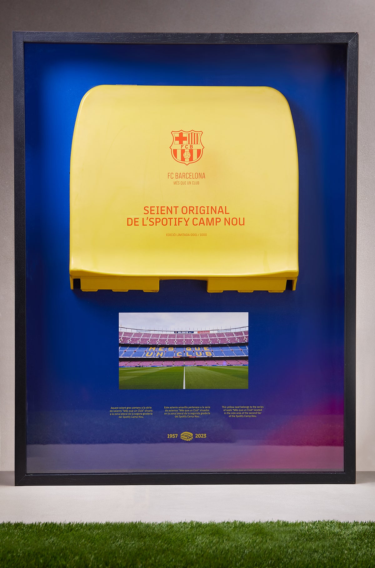 Framed original yellow seat from Spotify Camp Nou with FC Barcelona crest and commemorative plaque