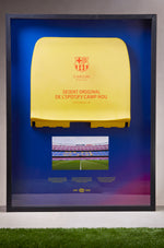 Framed original yellow seat from Spotify Camp Nou with FC Barcelona crest and commemorative plaque