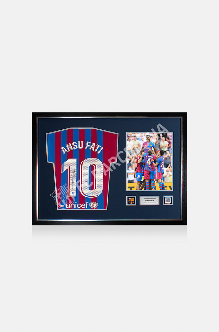 Framed FC Barcelona jersey signed by Ansu Fati with number 10, next to a photo of the player celebrating with teammates.