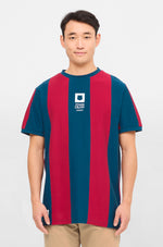 Retro-style FC Barcelona T-shirt with classic vertical blue and red stripes and a large white number 9 printed on the back.