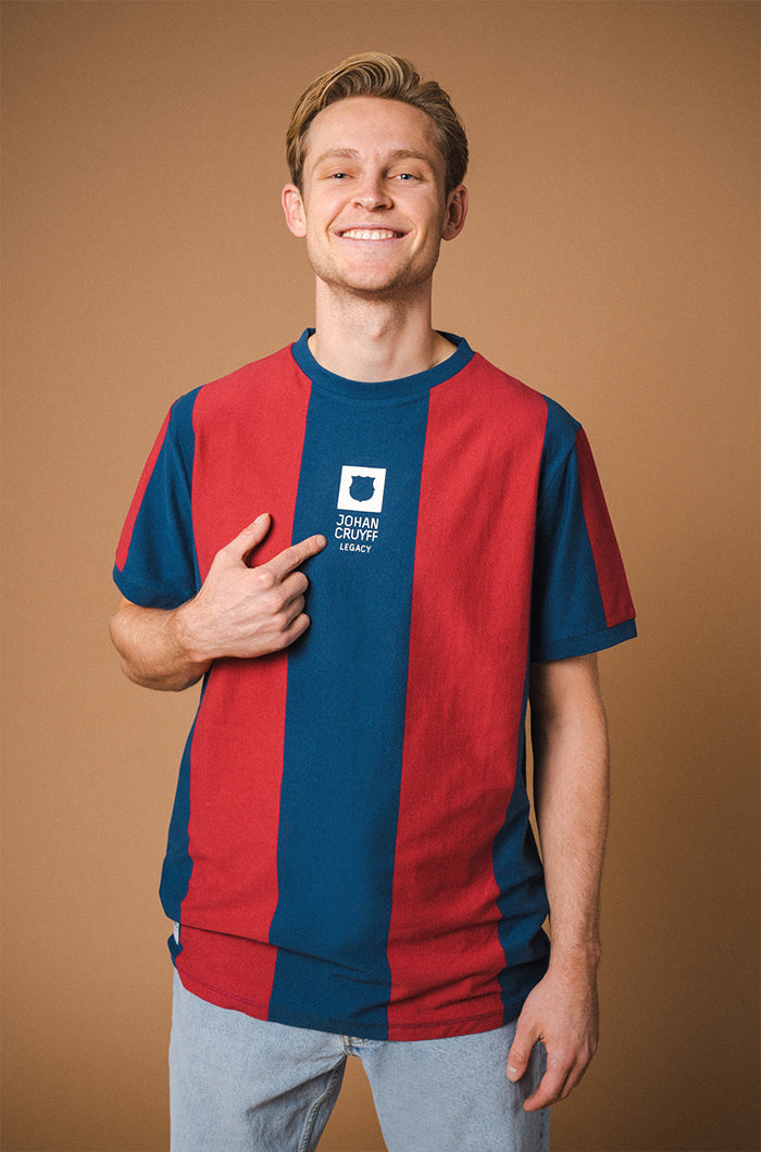 Retro-style FC Barcelona T-shirt with classic vertical blue and red stripes and a large white number 9 printed on the back.