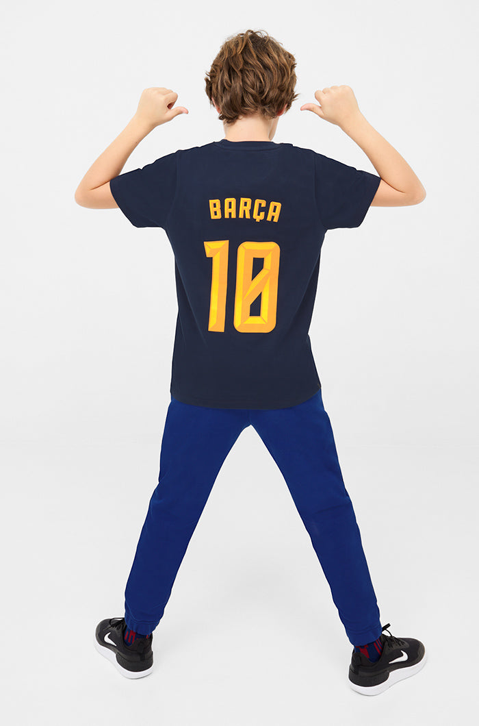 Back view of a navy FC Barcelona jersey with 'BARÇA' text and the number 10 printed in bold yellow.