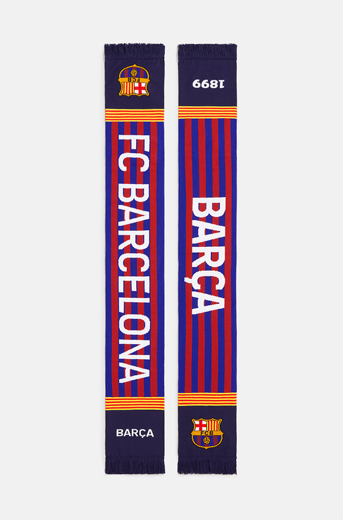 Double-sided FC Barcelona scarf with blue and red vertical stripes, featuring the club crest and the words 'FC BARCELONA' on one side and 'BARÇA' with '1899' on the other.