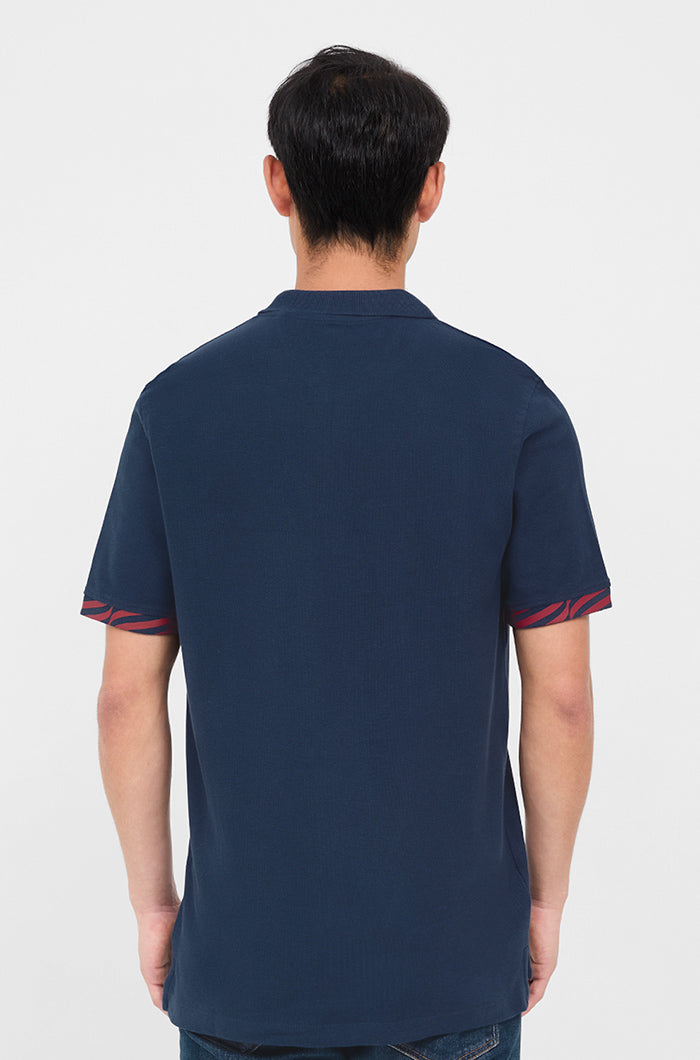 Polo shirt with blue-and-scarlet fringes