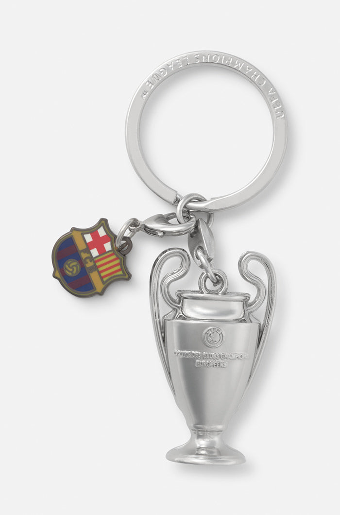 Silver keychain featuring a miniature UEFA Champions League trophy and a small FC Barcelona crest charm.